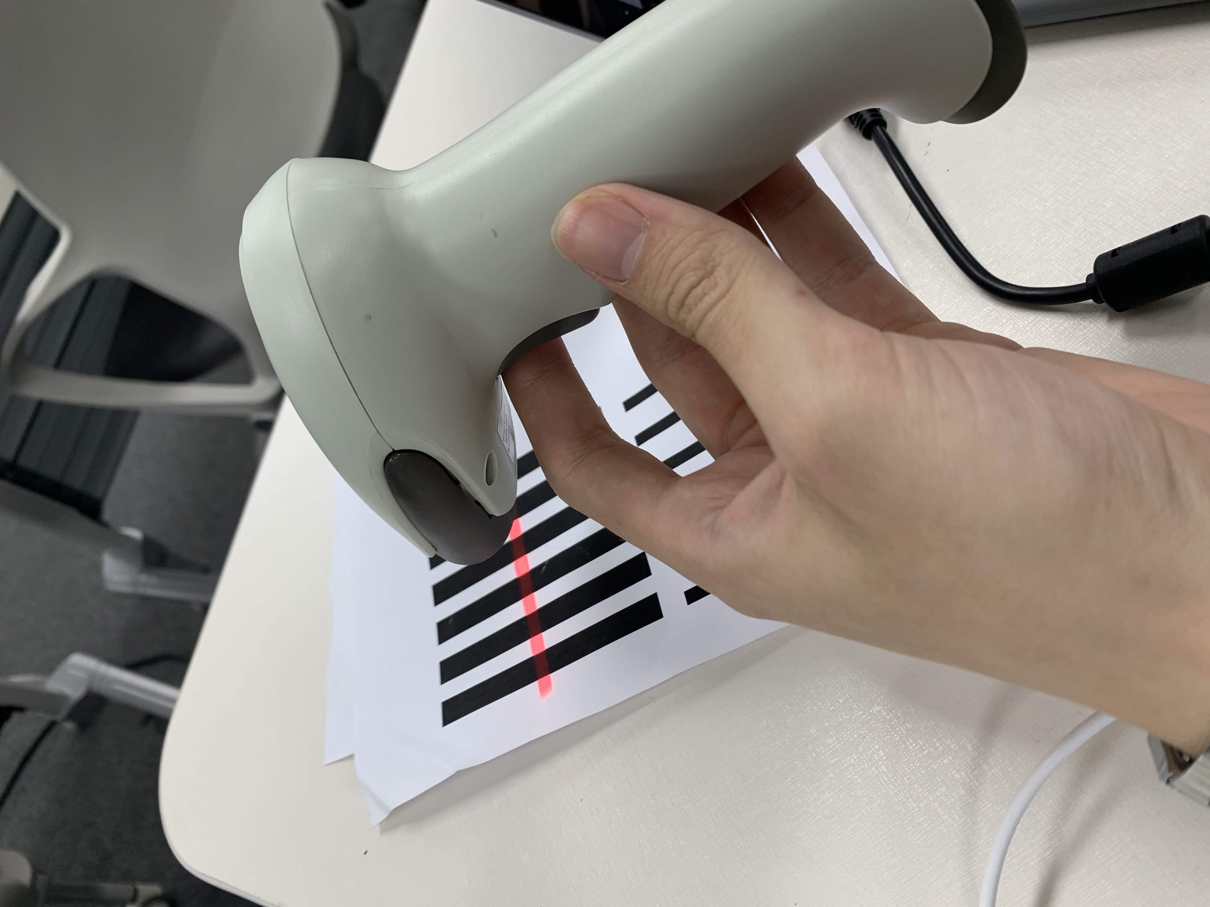 Visitors interacting with the furniture at the exhibition booth